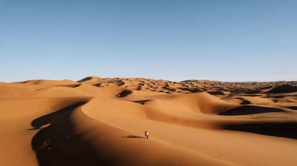 Sunlit dunes of Erg Chebbi on the Sahara day
