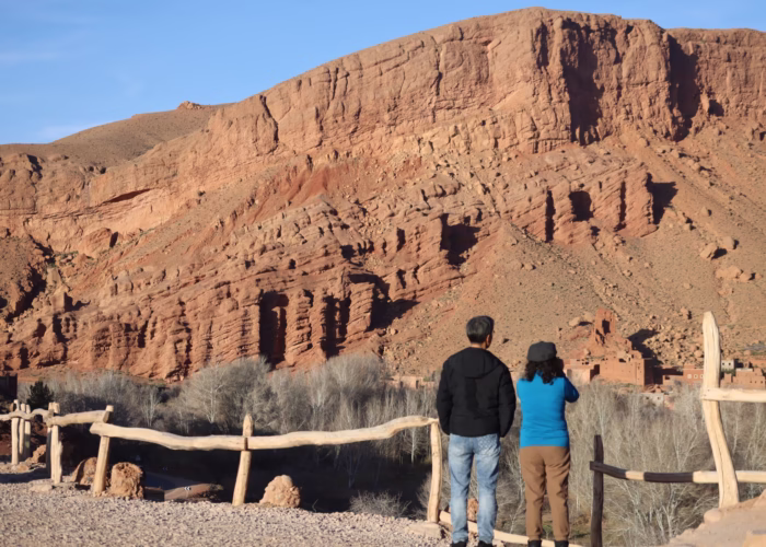 A couple enjoying the panoramic view of the monkey fingers in Dades valley - Morocco travel package - agadir holiday - Morocco excursion - Morocco tour package
