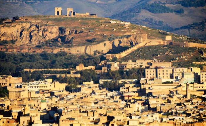 The panoramic view of the Medina of Fes from the Borj south during our 8 day Morocco tour from Fes - Morocco Roundtrip from Fes - Morocco travel package - Morocco holiday from Fes. - Morocco trip package from Fes - Morocco tour 8 days